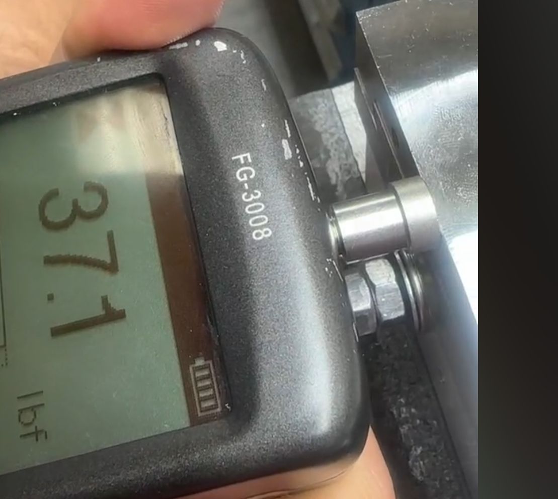 Dial indicator and force gauge stiffness measurement setup
