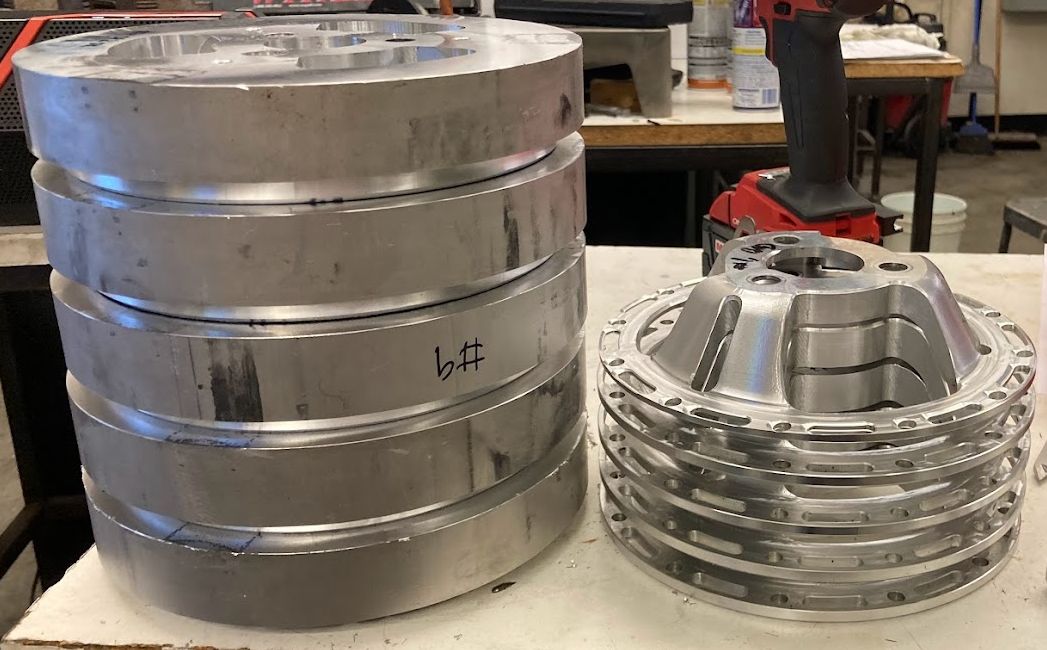 Wheel center stock and finished parts